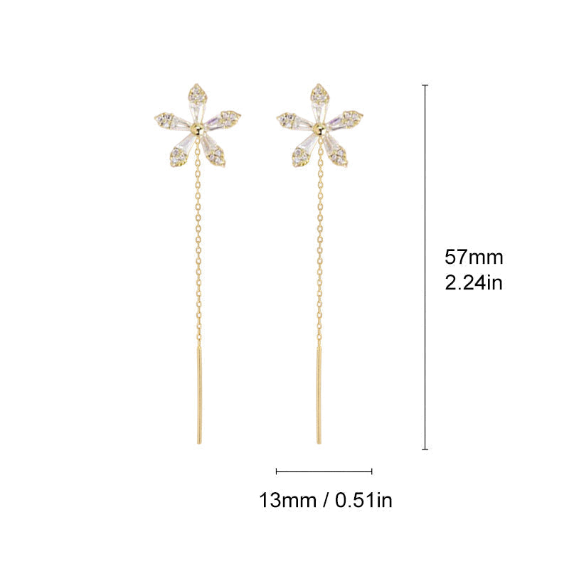 Blomsterörhängen med glänsande fransar ett par